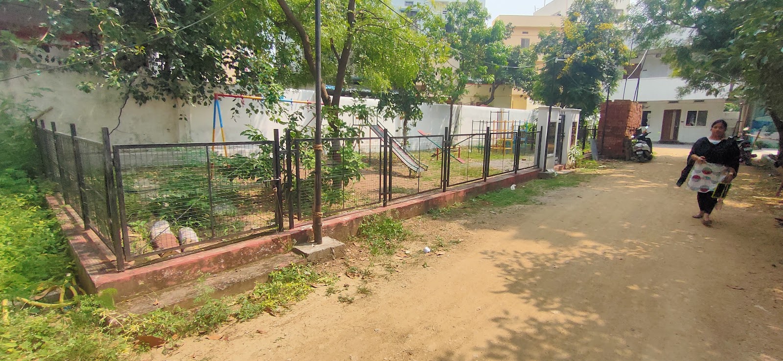 Fenced playground area in the school grounds